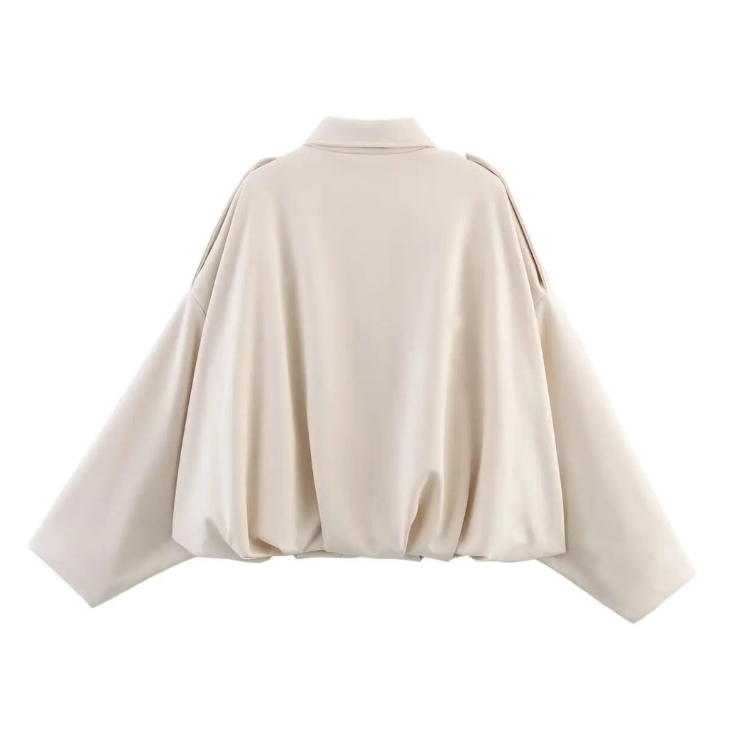 Beige cape on a white background