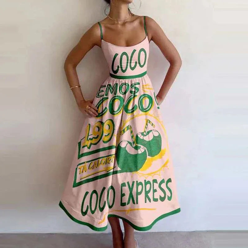 Dress with 'Coco Express' print worn by a person against a plain background