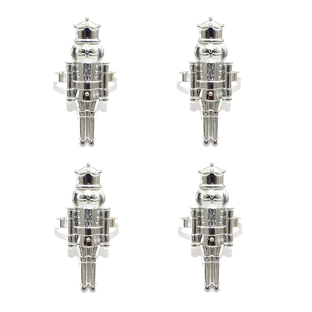 Four silver bottle stoppers on a white background