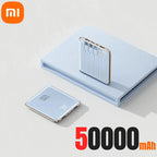 Phone with power bank and '50000 mAh' text on a light background