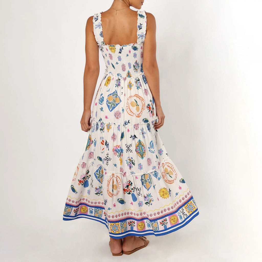 Woman wearing a colorful floral dress with a white background