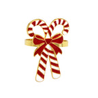 Crescent moon-shaped ring with candy cane design on a white background