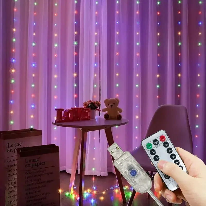 Colorful LED string lights on a curtain with a remote control held by a hand.