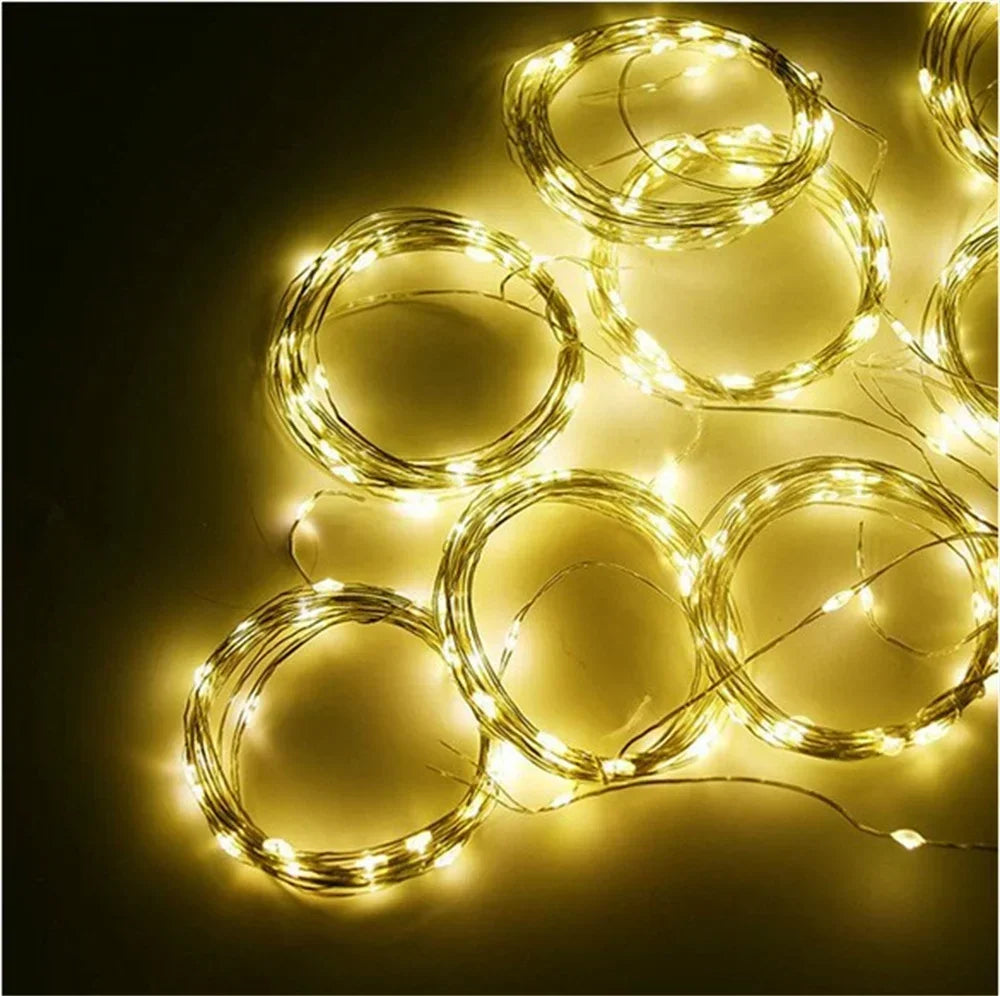 String of small LED lights on a dark background
