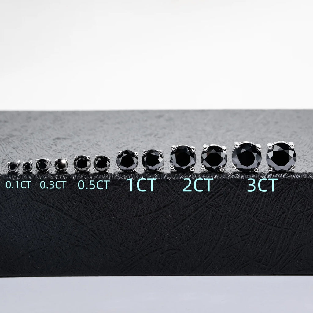 Diamonds of different carat weights on a scale with labels below.