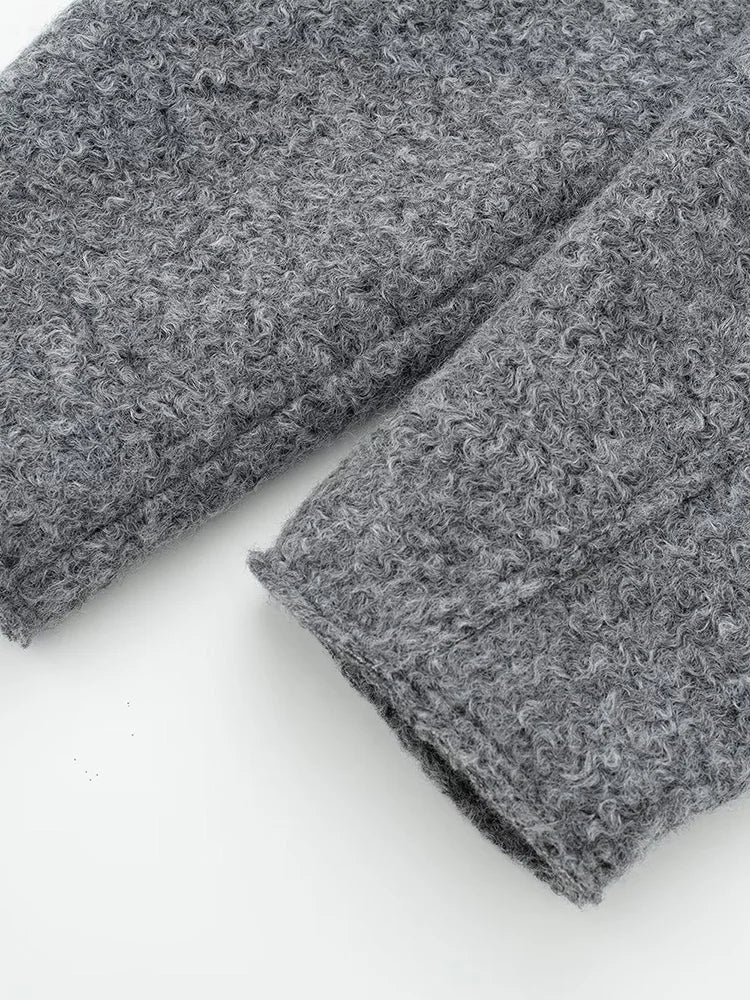 Two gray textured towels on a white background