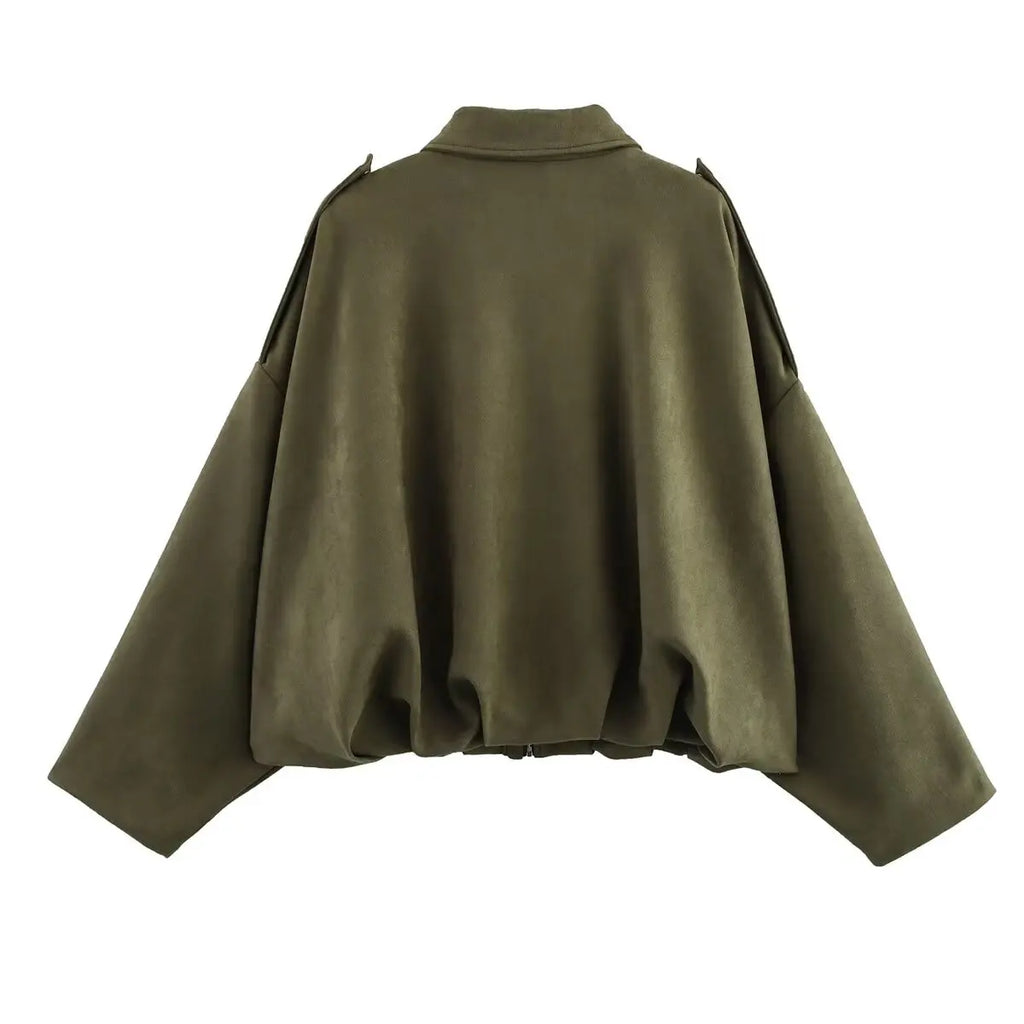 Green cape on a white background