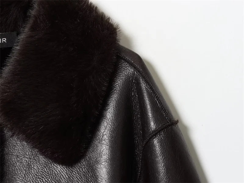 Black leather jacket with fur collar on a white background