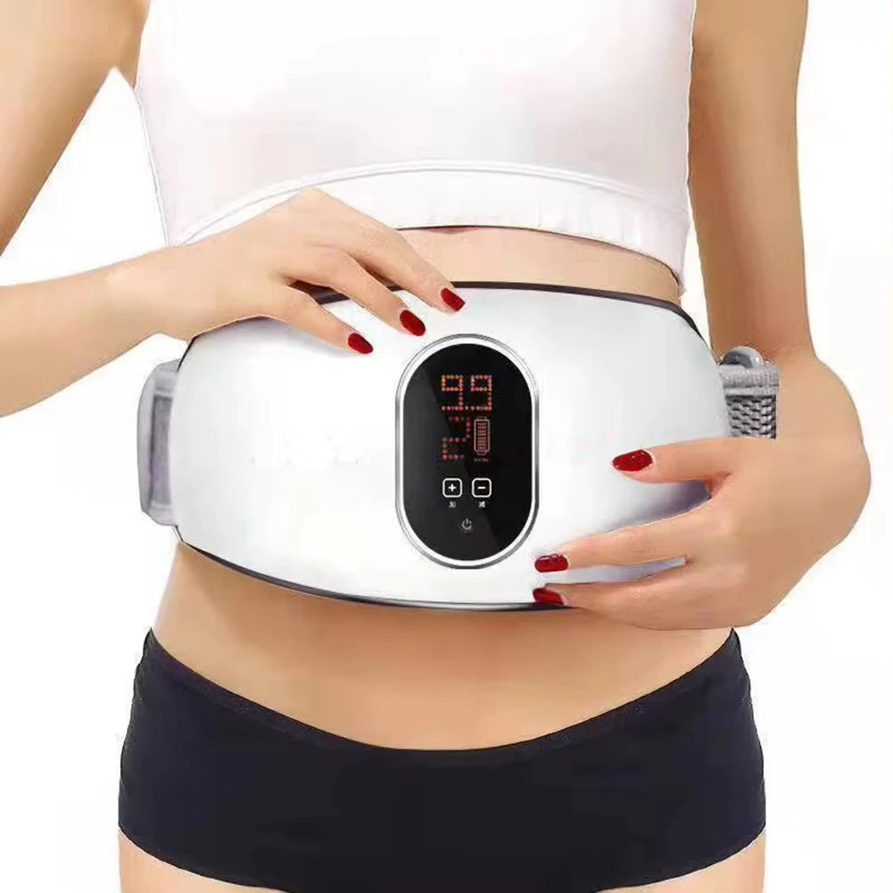Person wearing a white top and black shorts with a waist massager on a white background