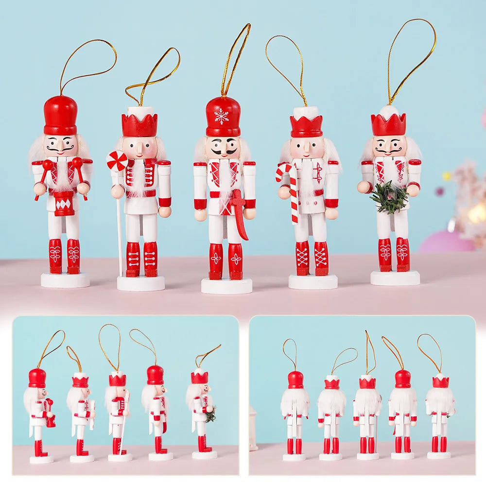 Set of Christmas-themed nutcracker ornaments with red and white attire on a light blue background.