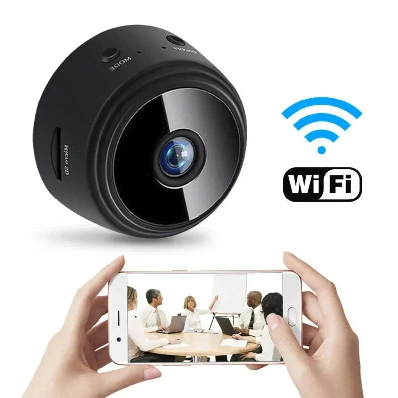 Black WiFi camera with smartphone displaying a video call, on a white background