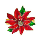 Red and green poinsettia flower brooch with a central gemstone on a white background