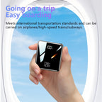 Hand holding a small electronic device with airplane window and sky background