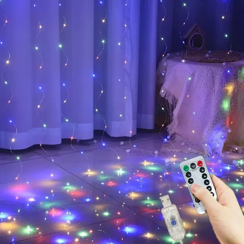 Colorful string lights on a floor with a remote control in a room setting.