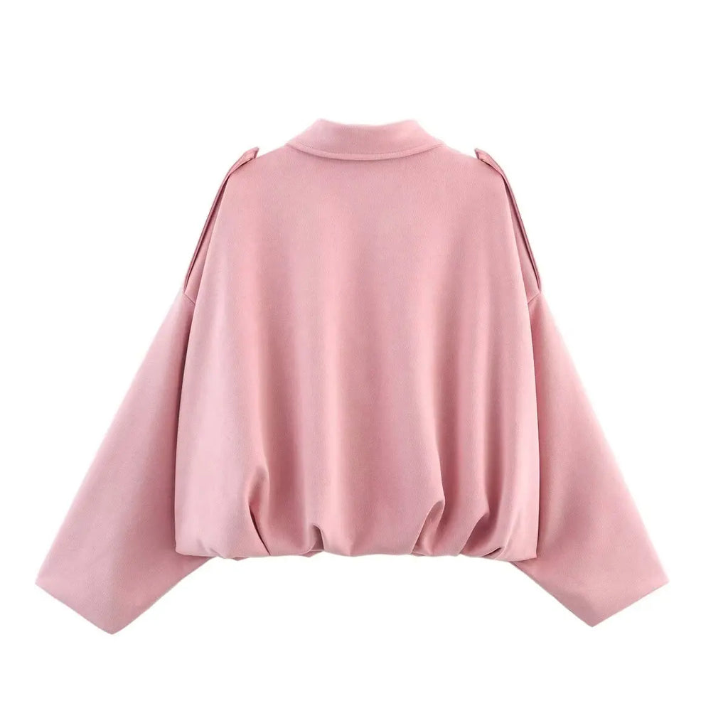 Pink cape on a white background