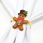 Gingerbread man napkin ring with a top hat and bow tie on a white cloth background