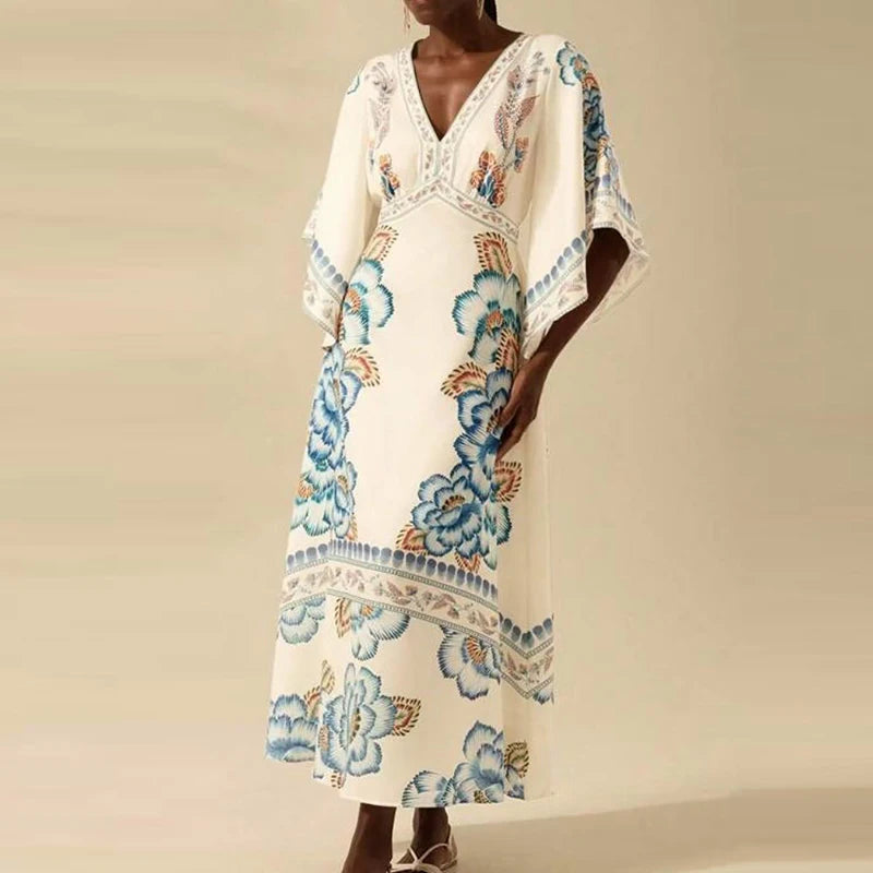 Woman wearing a floral patterned dress on a beige background