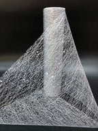 Close-up of a cone-shaped object made from a fibrous material on a black background