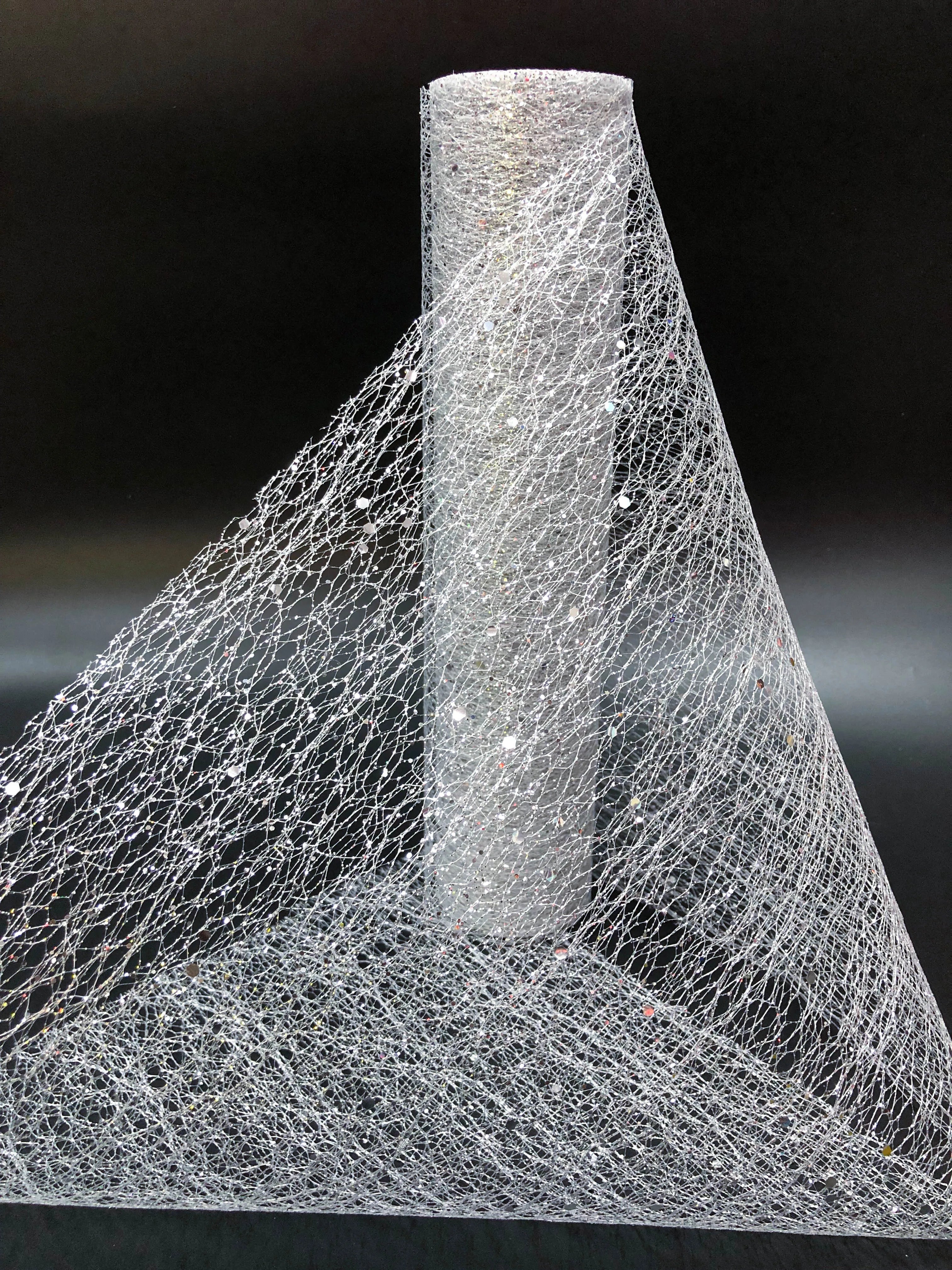 Close-up of a cone-shaped object made from a fibrous material on a black background