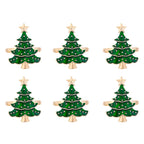 Set of six green Christmas tree-shaped earrings with gold bases on a white background