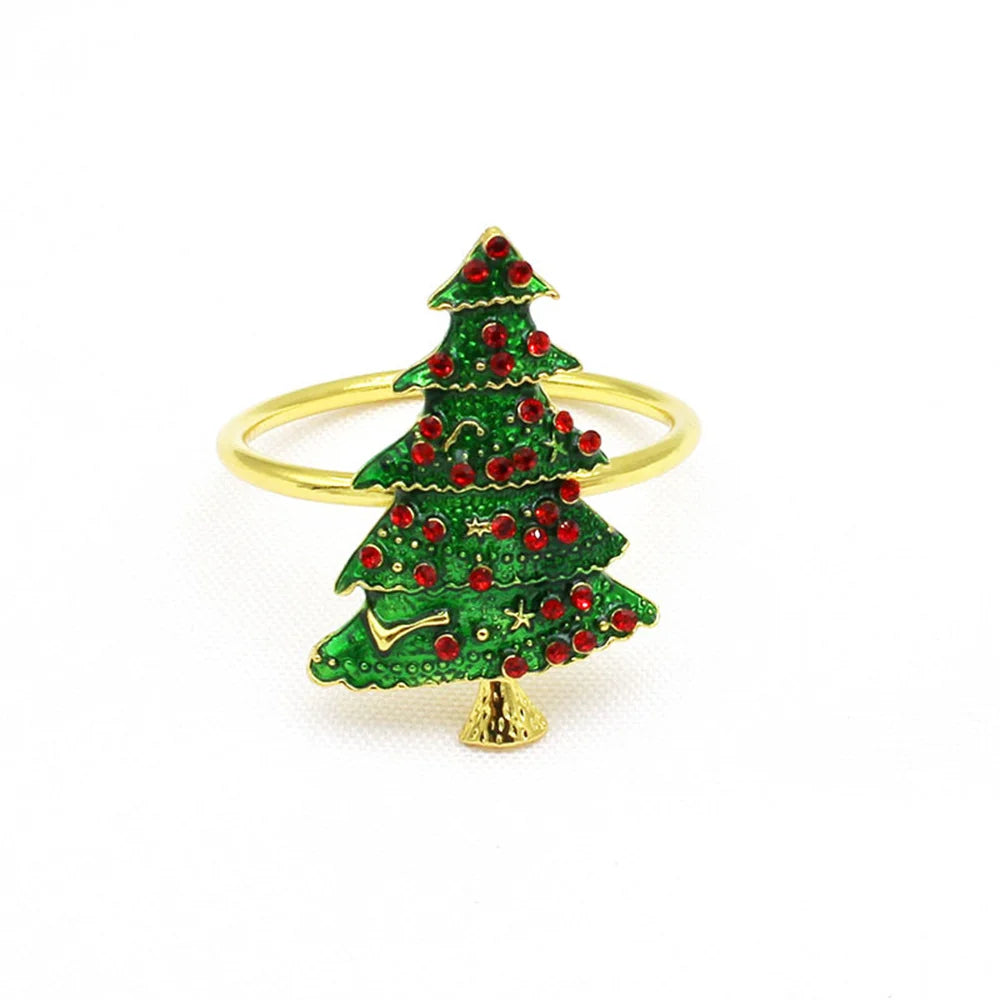 Christmas tree-shaped ring with green and red details on a white background