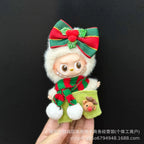 Small toy figure with a festive outfit and bow on a black background