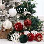 Decorative Christmas ornaments on a tree with a white background