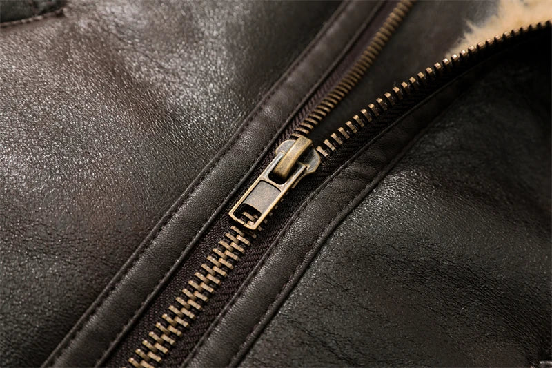 Close-up of a zipper on a black leather jacket