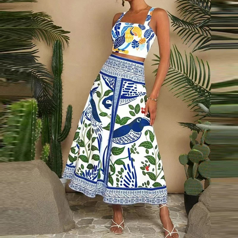 Woman wearing a patterned two-piece outfit with plants in the background