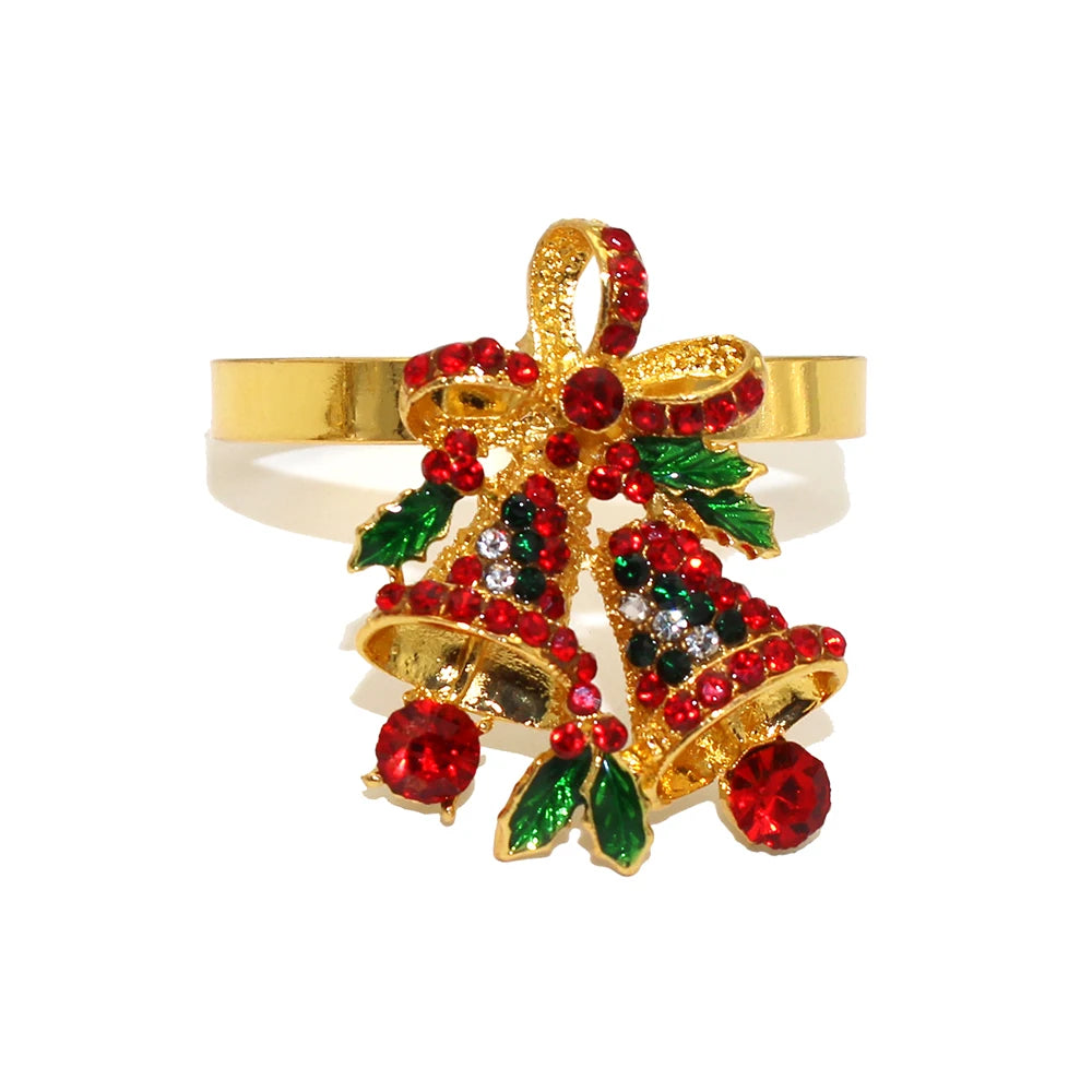 Decorative brooch with red and green gemstones on a white background
