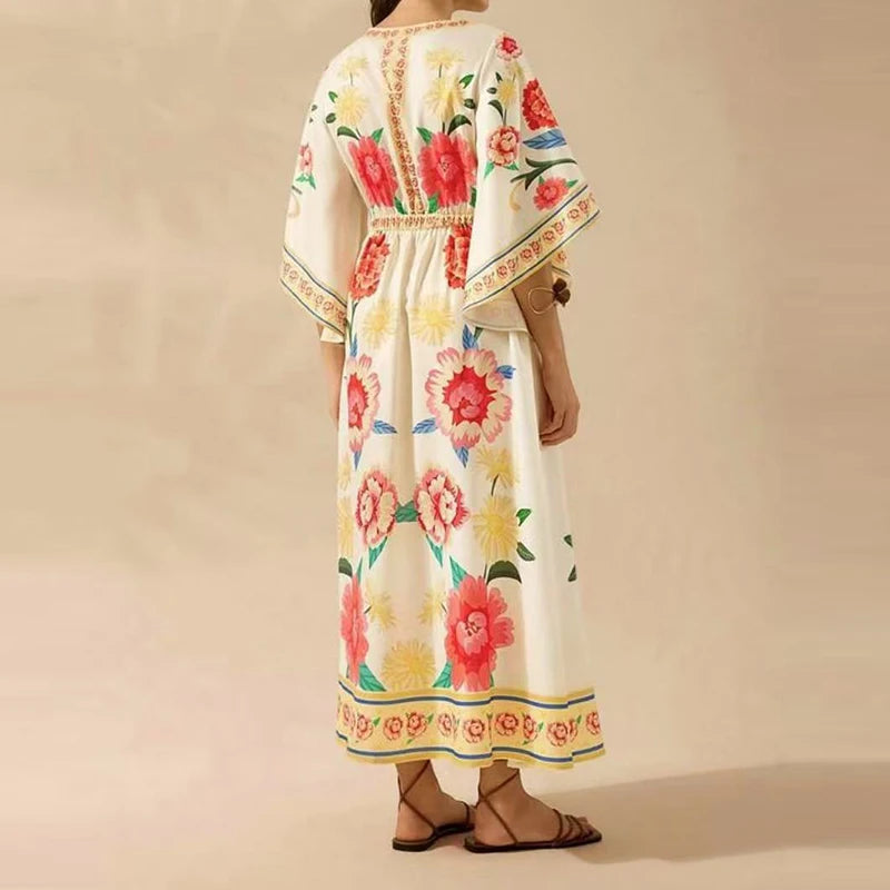Floral embroidered dress on a beige background