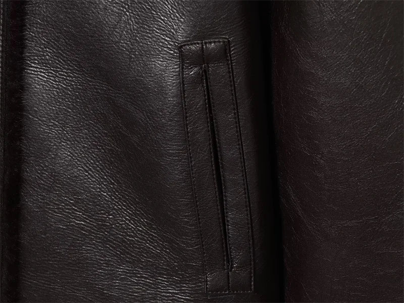 Close-up of black leather texture with a zipper