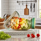 Glass jar with salad on a kitchen counter
