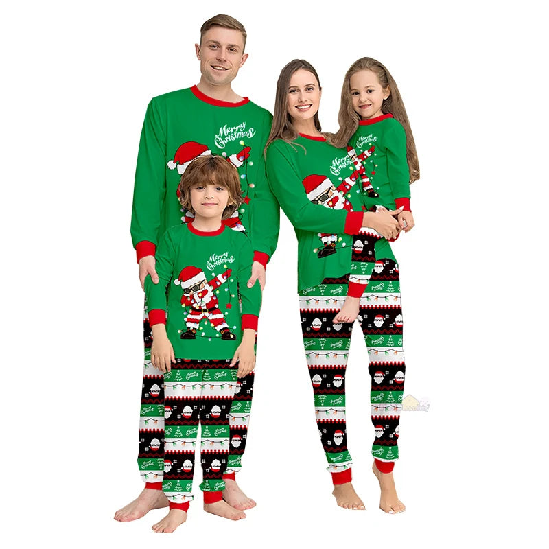 Family wearing matching Christmas pajamas with Santa Claus designs on a white background