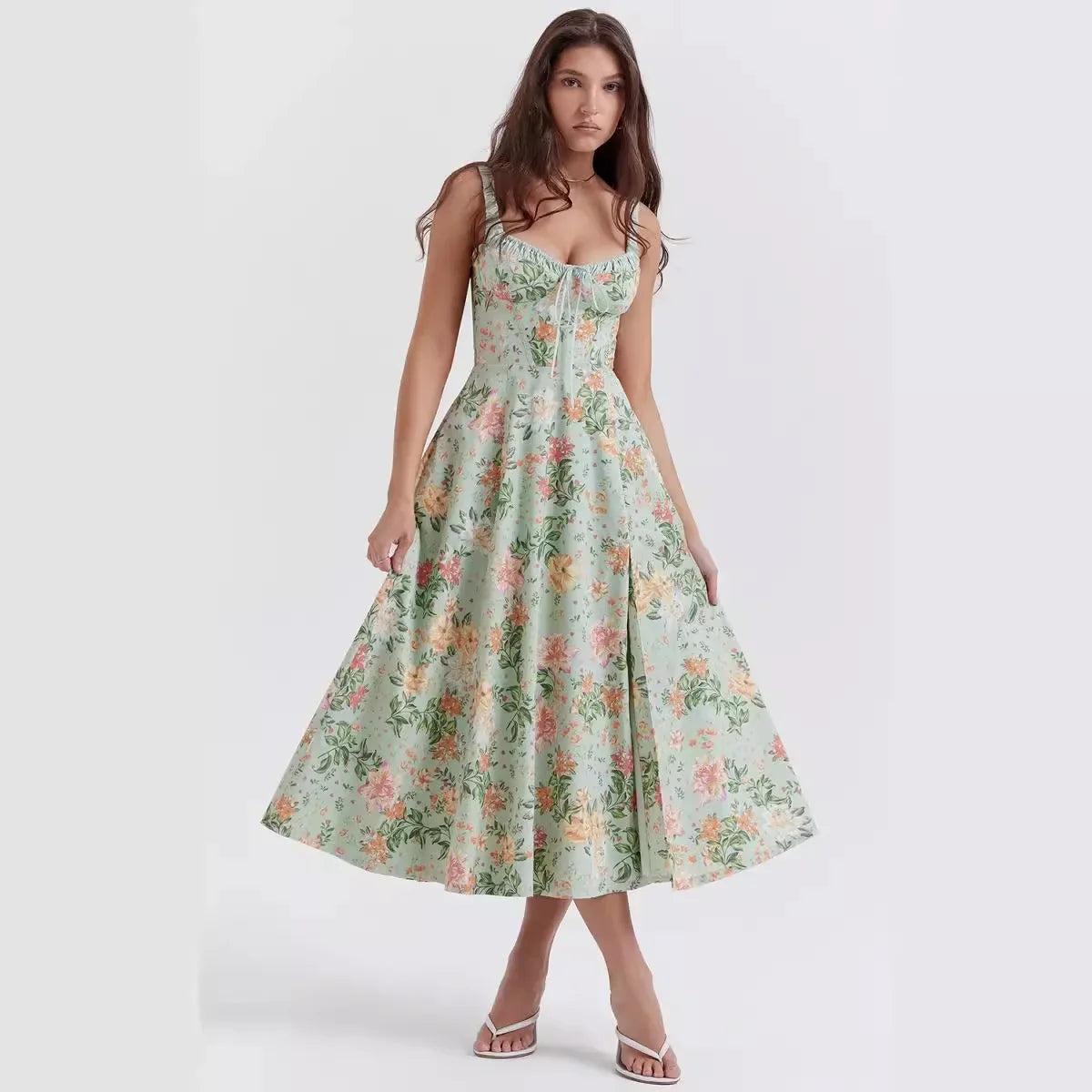 Woman wearing a floral dress on a white background