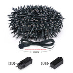 String lights with extension cord and plug adapters on a white background