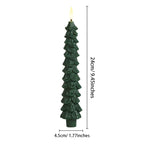 Green candle shaped like a Christmas tree with measurements on a white background