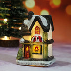 Decorative Christmas house with glowing lights on a blurred festive background