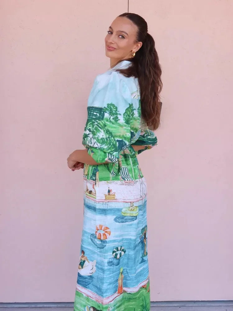 Woman wearing a colorful outfit with a patterned design against a pink background