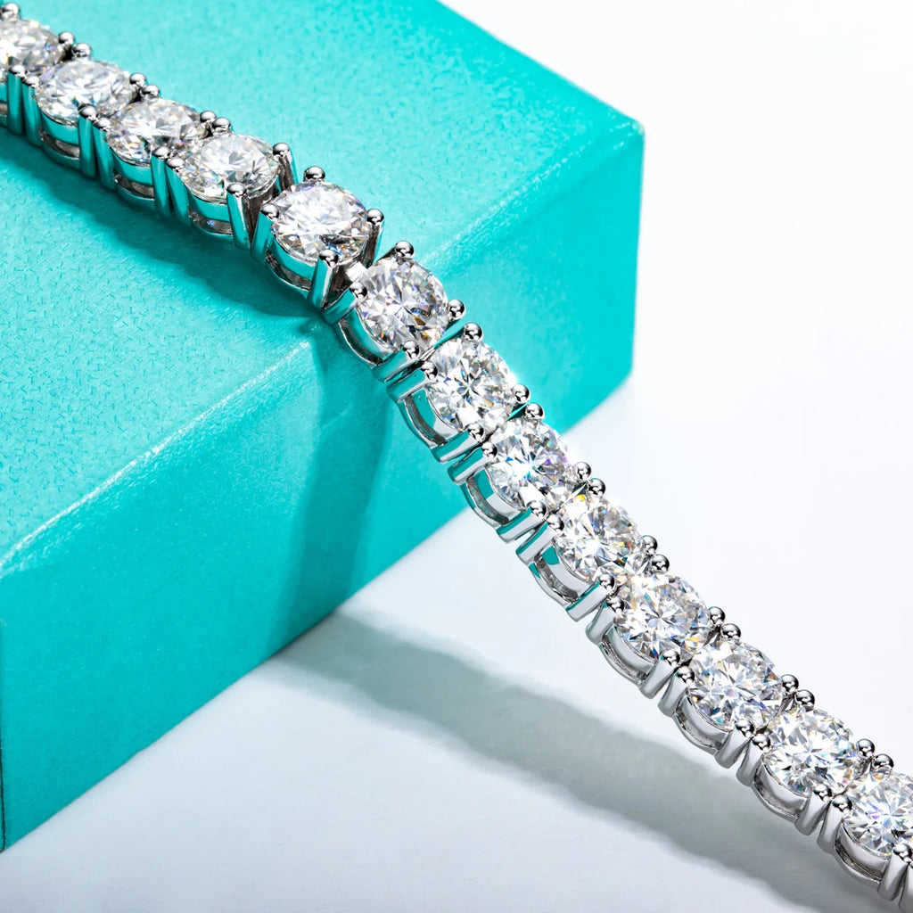 Diamond bracelet on a turquoise box with a white background
