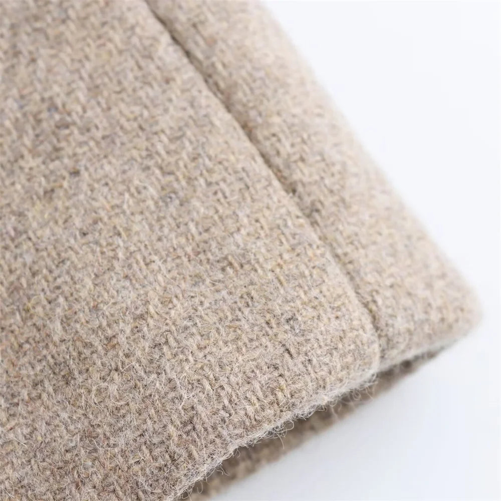 Close-up of beige fabric on a white background