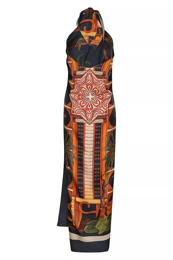 Long dress with intricate geometric and nature-inspired patterns on a white background