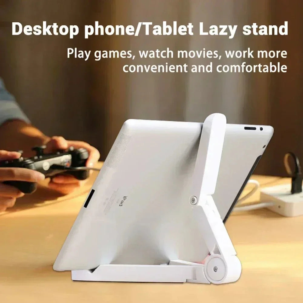 White phone/tablet lazy stand on a desk with text describing its uses.