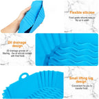Blue silicone scrubber with features highlighted on a marble background